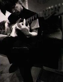 playing the guitar