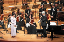 Ryuichi Sakamoto and actress Sayuri Yoshinaga at a charity concert at the Suntory Hall in Tokyo on March 26. (Provided by Dentsu Public Relations Inc.)