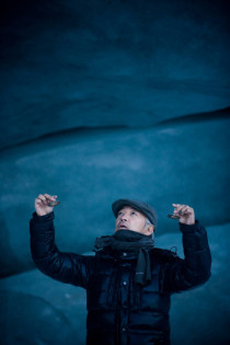 Ryuichi Sakamoto recording sound at the mouth of Sermeg Avangnardleq Glacier during Cape Farewell's 2008 Disko Bay expedition. Photo by Nathan Gallagher.